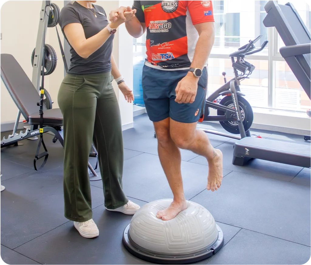 Patient performing guided ankle mobility and strengthening exercises during physiotherapy at Sno Clinics Abu Dhabi - Snö Clinics | Abu Dhabi