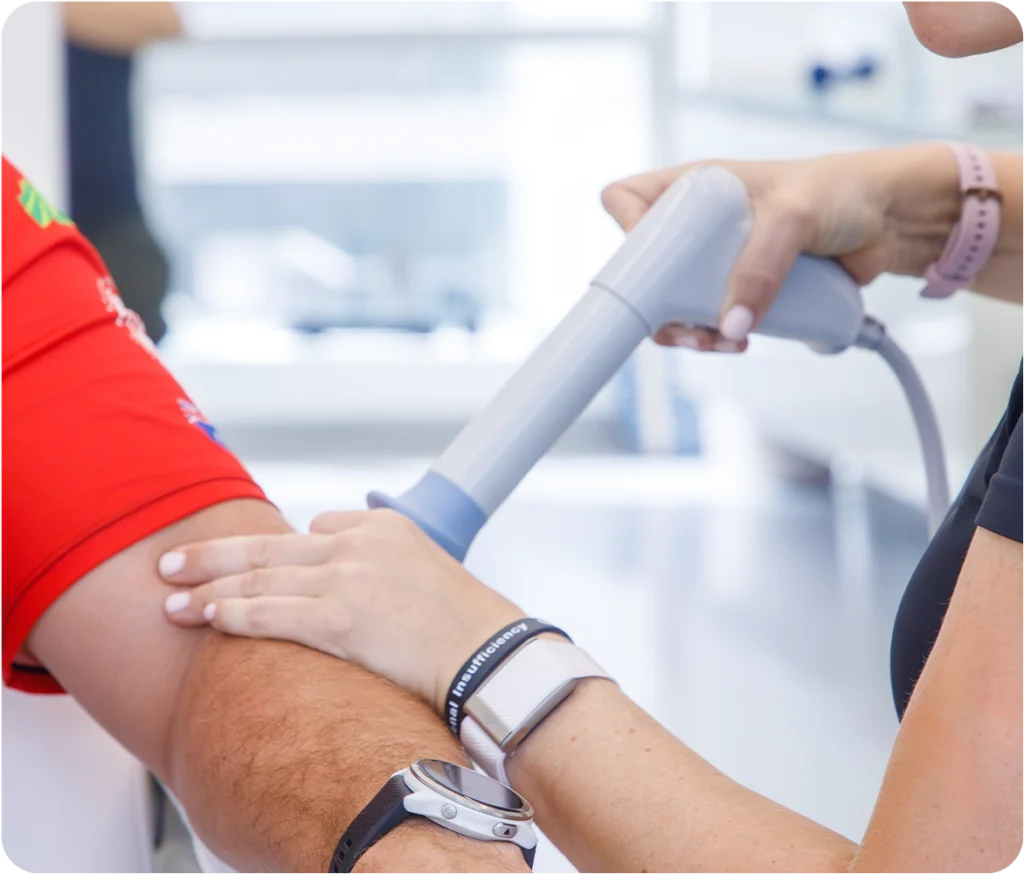 Patient performing guided exercises for elbow pain relief during a physiotherapy session at Sno Clinics Abu Dhabi - Snö Clinics | Abu Dhabi Patient performing guided exercises for elbow pain relief during a physiotherapy session at Sno Clinics Abu Dhabi.