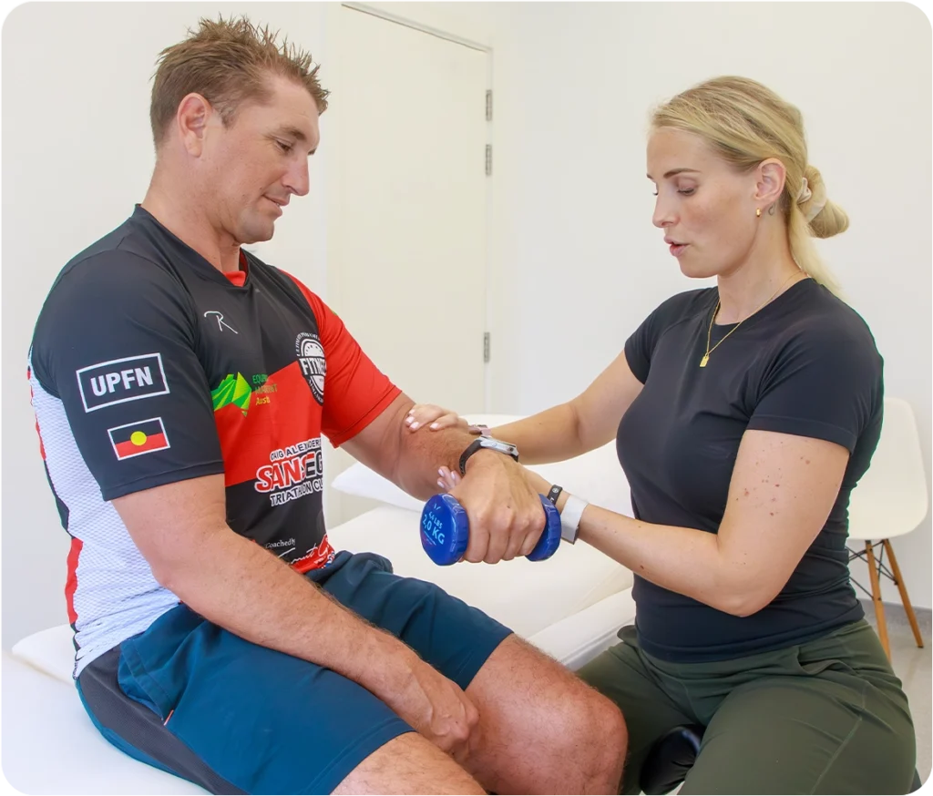 Patient receiving targeted manual therapy for wrist and hand pain relief at Sno Clinics Abu Dhabi - Snö Clinics | Abu Dhabi