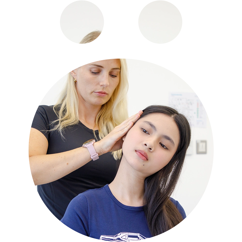 Physiotherapist applying gentle manual therapy to relieve headache and migraine symptoms at Sno Clinics Abu Dhabi - Snö Clinics | Abu Dhabi Physiotherapist applying gentle manual therapy to relieve headache and migraine symptoms at Sno Clinics Abu Dhabi.